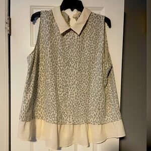 Sleeveless cheetah work shirt